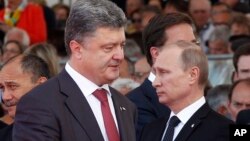 Президенти Петро Порошенко і Володимир Путін у Франції