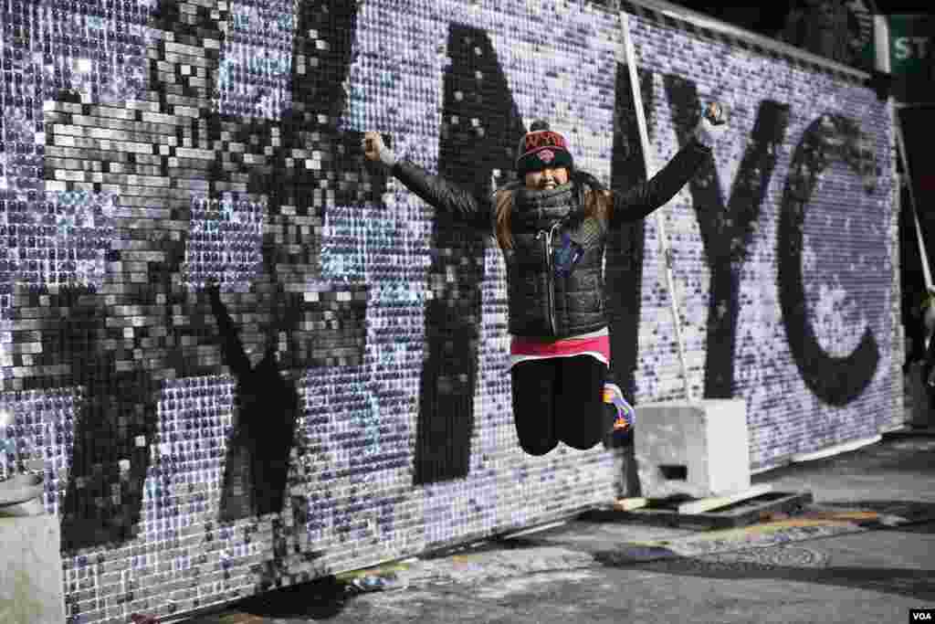 A fan visits the Super Bowl Boulevard fan zone ahead of Super Bowl XLVIII in New York, Jan. 30, 2014.