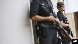Police guarding an avenue in Singapore, June 4, 2010 