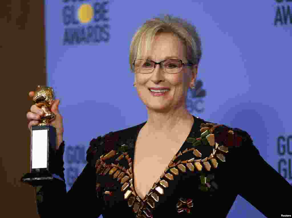 Meryl Streep holds the Cecil B. DeMille Award during the 74th Annual Golden Globe Awards in Beverly Hills, California, Jan. 8, 2017.