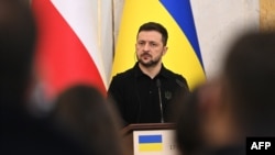 Ukrajinski predsednik Volodimir Zelenski na zajedničkoj konferenciji za novinare sa premijerom Poljske u Lavovu, 17. decembar, 2024. (Foto: AFP / Yuriy DYACHYSHYN / AFP)