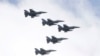 ARCHIVO: Aviones F16 de fabricación estadounidense de la fuerza aérea de Taiwán vuelan sobre Taipéi el 10 de octubre de 2021.