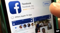 FILE - This photo shows Facebook launched on an iPhone, in North Andover, Massachusettds, June 19, 2017.
