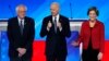 De la gauche vers la droite, Bernie Sanders, Joe Biden, et Elisabeth Warren, trois candidats à l'investiture démocrate qui devront désormais compter avec l'ancien maire de New York, Michael Bloomberg.