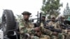 FILE - Ripxe loltoonni M23 rebels loltoota Ruwaandaa as suraa kana irratti hin argamne Gomaa keessatti erga qabamanii booda Ennaa gara daangaa Goomaatti geessan Bitootessa 1, bara 2025