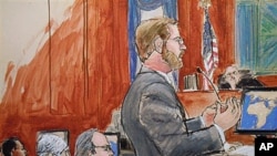 Assistant U.S. Attorney Nicholas Lewin (r) gives his opening statement to the jury in the trial of Ahmed Khalfan Ghailani (l), as lead defense attorney Steve Zissou, third from left, and Judge Lewin Kaplan, right, look on in Manhattan Federal Court in New