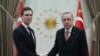 Turkey's President Recep Tayyip Erdogan shakes hands with Jared Kushner (L), U.S. President Donald Trump's adviser, prior to their meeting at the Presidential Palace in Ankara, Turkey, Feb. 27, 2019. 