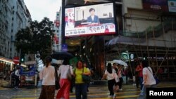 A news conference of Hong Kong's Chief Executive Carrie Lam is televised in Hong Kong, Sept. 4, 2019. 