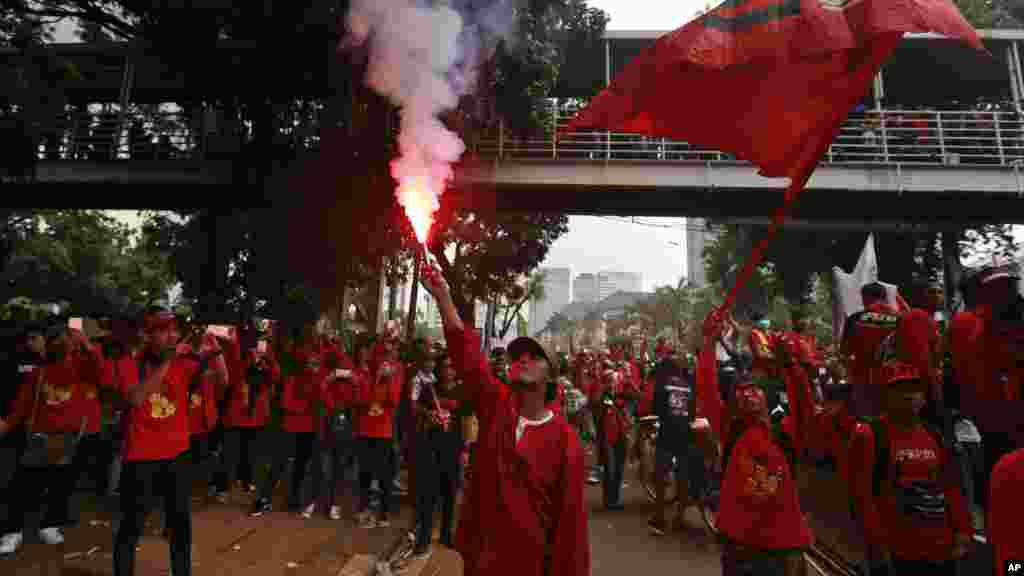 Ma'aikata a Jakarta ta kasar Indonesia, ranar 1, ga watan Mayu, na 2017. 