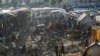 Warga Palestina memeriksa kerusakan yang terjadi pada area tenda di halaman Rumah Sakit Al Aqsa di Deir al Balah, Jalur Gaza, pada 14 Oktober 2024, menyusul serangan Israel ke area tersebut. (Foto: AP/Abdel Kareem Hana)