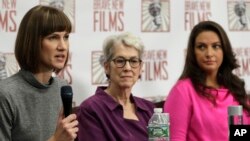Rachel Crooks, left, Jessica Leeds, center, and Samantha Holvey attend a news conference, Monday, Dec. 11, 2017, in New York to discuss their accusations of sexual misconduct against Donald Trump. (AP Photo/Mark Lennihan)