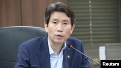 Newly appointed unification minister Lee In-young works in Seoul, South Korea, July 28, 2020. Picture taken July 28, 2020. Yonhap via REUTERS ATTENTION EDITORS - THIS IMAGE HAS BEEN SUPPLIED BY A THIRD PARTY. SOUTH KOREA OUT. NO RESALES. NO ARCHIVE.