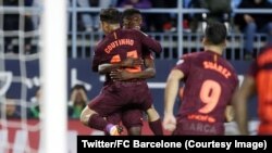 Couthino et Dembélé du FC Barcelone après un but lors du match contre Malaga, au stade La Rosaleda, Espagne, 10 mars 2018. (Twitter/FC Barcelone)