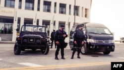 Efectivos de la Brigada Nacional Especial custodian las calles de La Habana, capital de Cuba, el 11 de julio de 2021, cuando estallaron manifestaciones pacíficas contra el gobierno.