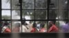 Masaai line up to vote in a general election outside an elementary school in Kumpa, Kenya, March 4, 2013.