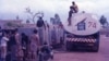 The donation includes 144 film slides, one audiocassette, and 1,220 digitalized photos.