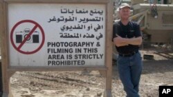 FILE - Mark Frerichs, a contractor from Illinois, poses in Iraq in this undated photo obtained from Twitter that he would include with his resume when job hunting. Frerichs was abducted in Afghanistan in January 2020.