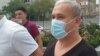 Bobomurod Abdullayev sud binosiga keltirilmoqda, Bishkek, Qirg'iziston
