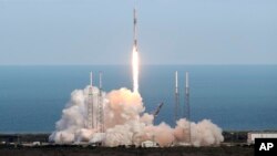 A SpaceX Falcon 9 rocket lifts off from launch complex 40 at the Cape Canaveral Air Force Station in Cape Canaveral, Florida, April 2, 2018.
