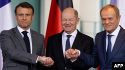 Francuski predsjednik Emanuel Makron, njemači kancelar Olaf Šolc i poljski premijer Donald Tusk na sastanku u Berlinu (Foto: Odd ANDERSEN / AFP)