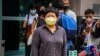 Journalist Bao Choy is pictured outside Fanling Magistrates Court after her hearing, Nov. 10, 2020. (Tommy Walker/VOA)