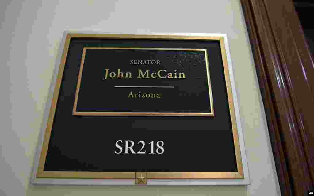 The sign marking the office of Sen. John McCain is seen on Capitol Hill in Washington, Aug. 26, 2018.