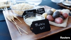 Ingredients for plant-based hamburgers, including a protein gel, are on display during a media tour of Impossible Foods labs and processing plant in Redwood City, California, U.S. October 6, 2016. (REUTERS/Beck Diefenbach)