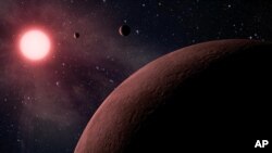 This artist rendering provided by NASA/JPL-Caltech shows some of the 219 new planet candidates, 10 of which are near-Earth size and in the habitable zone of their star identified by NASA’s Kepler space telescope. (NASA/JPL-Caltech)