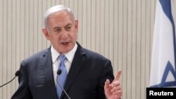 Israeli Prime Minister Benjamin Netanyahu speaks during a news conference with Cypriot President Nicos Anastasiades and Greek Prime Minister Alexis Tsipras at the Presidential Palace in Nicosia, Cyprus, May 8, 2018.
