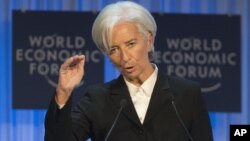 International Monetary Fund Managing Director Christine Lagarde gestures as she speaks to the assembly at the 43rd Annual Meeting of the World Economic Forum in Davos, Switzerland, Jan. 23, 2013.