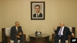 Lakhdar Brahimi bertemu Menlu Suriah Walid Moallem di Damaskus Kamis (13/9).