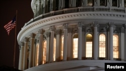 FILE - The U.S. Capitol Building as seen ahead of a vote on the coronavirus relief bill on Capitol Hill in Washington, March 25, 2020.