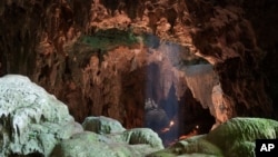 This undated photo provided by the Callao Cave Archaeology Project in April 2019 shows Callao Cave on Luzon Island of the Philippines, where the fossils of Homo luzonensis were discovered. (Callao Cave Archaeology Project via AP)