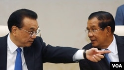 中国国务院总理李克强和柬埔寨首相洪森2018年1月11日在金边举行双边会谈(路透社)