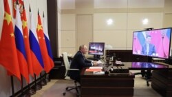 習近平與普京視頻會晤 “背靠背戰略協作”能走多遠?
