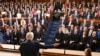 US President Donald Trump gestures as he speaks during an address to a joint session of Congress at the US Capitol in Washington, on March 4, 2025. 