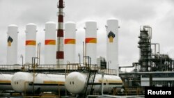 FILE - A general view shows the Achinsk oil refining factory, owned by the Rosneft company.
