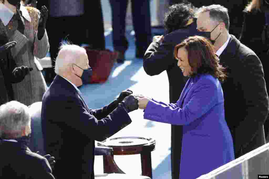 President-elect Joe Biden and Vice President Kamala Harris during the inauguration of Joe Biden as the 46th President of the United States on the West Front of the U.S. Capitol in Washington, U.S., January 20, 2021. REUTERS/Brendan McDermid