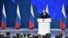 Russian President Vladimir Putin addresses the Federal Assembly, including the State Duma parliamentarians, members of the Federation Council, regional governors and other high-ranking officials, in Moscow, Feb. 20, 2019. 
