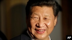 Presiden China Xi Jinping saat mengunjungi SMA Lincoln, Rabu (23/9).