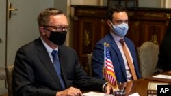 US Special Envoy for the Horn of Africa Jeffrey Feltman, left, meets with Egyptian Foreign Minister Sameh Shoukry at the foreign ministry in Cairo, Egypt, May 5, 2021. 