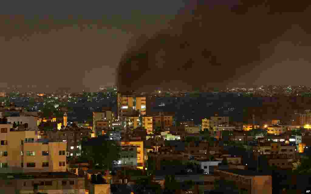 Smoke rises after an Israeli strike in Gaza City, July 11, 2014.