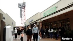 La acvitidad comercial en EE.UU. descendió en diciembre a causa de nuevos cierres de negocios y confinamientos por la pandemia de coronavirus.