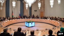 Participants attend the opening of two-day talks between Taliban and Afghan opposition representatives, at the President Hotel in Moscow, Russia, Feb. 5, 2019.