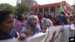 In this picture from video, Sudanese women rally on the streets of the capital, in Khartoum, Sudan, Sept. 12, 2019. 