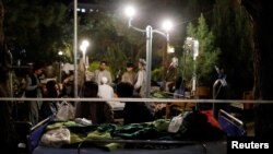 Deadly Afghans injured during the recent earthquake receive treatment at a hospital compound in Herat, Afghanistan October 8, 2023.