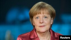 FILE - "I do not envisage fresh debt cancellation," German Chancellor Angela Merkel said in interviews published Saturday.