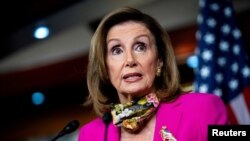 FILE - U.S. House Speaker Nancy Pelosi (D-CA) speaks during a news conference on Capitol Hill in Washington, Sept. 18, 2020. 