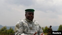 Congolese M23 rebel leader Bisimwa Bertrand speaks to the media in Bunagana, Aug. 2, 2013. 