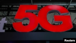 在2018年西班牙巴塞羅那舉行的世界移動通信大會上5G的標識 (資料圖片)